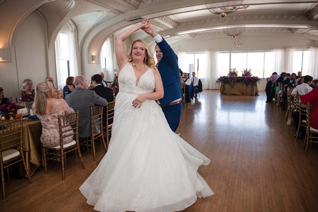 Bride and groom first dance in the grand ballroom at the Cottonwood Hotel in Omaha 