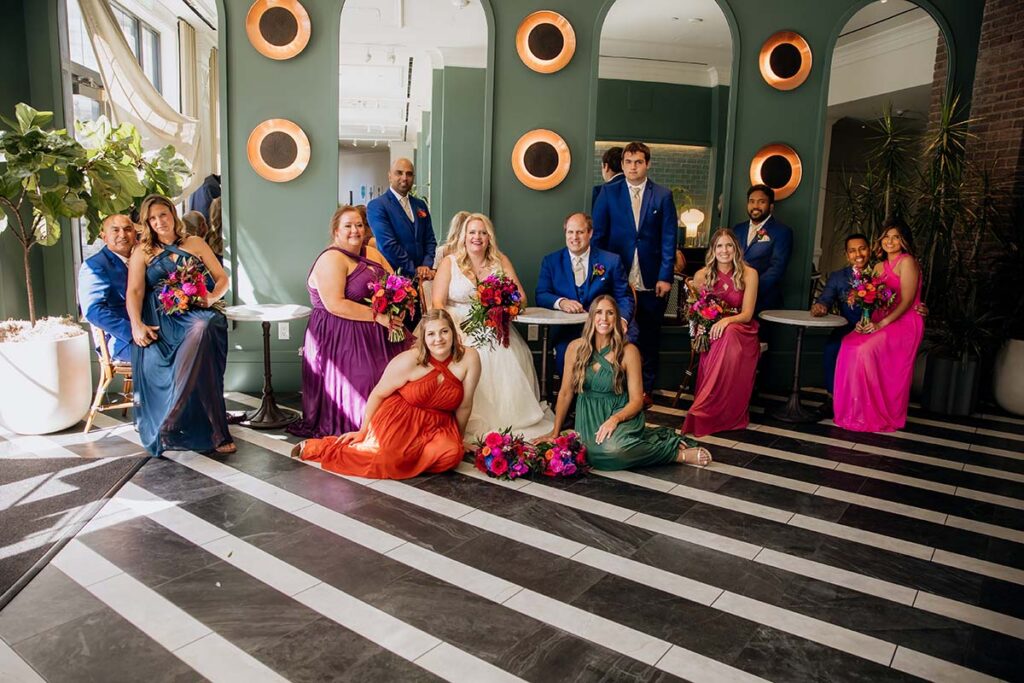 Colorful wedding party portraits at the Cottonwood Hotel in Omaha Nebraska
