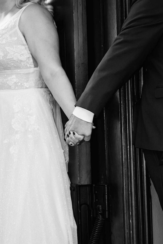 Bride and groom sharing a private vow reading before their wedding ceremony in Omaha Nebraska